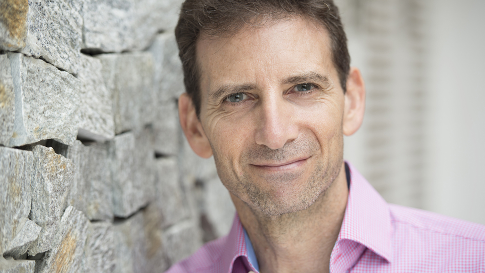 Headshot of Serge Benhayon smiling - Founder of Universal Medicine