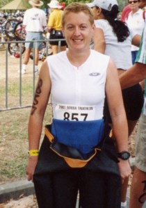Rachel Hall (Age 30): Me as a triathlete – anxious, uncomfortable, putting on a brave face, grimacing not really smiling.