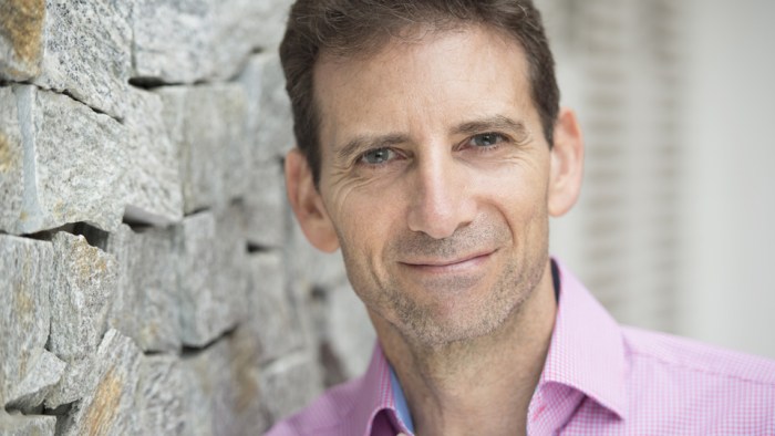 Headshot of Serge Benhayon smiling - Founder of Universal Medicine 