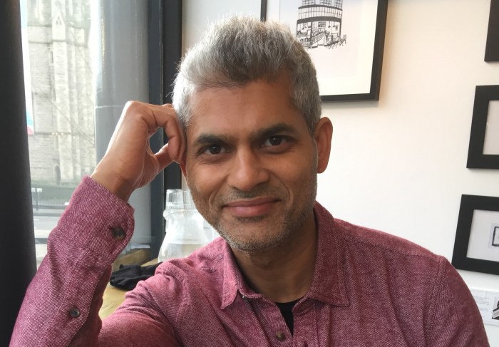 Chetan Jha smiling as he reflects on the Soul's Wisdom